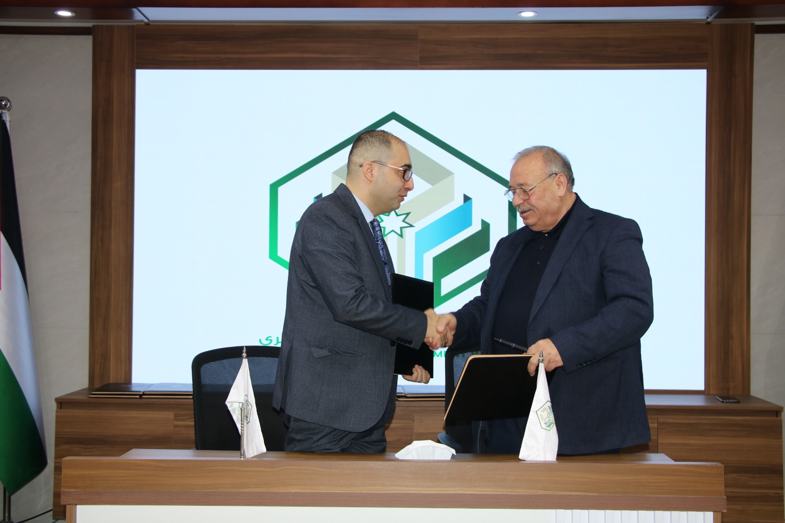  اتفاقية بين بلدية مادبا وبنك تنمية المدن والقرى لجدولة المديونية