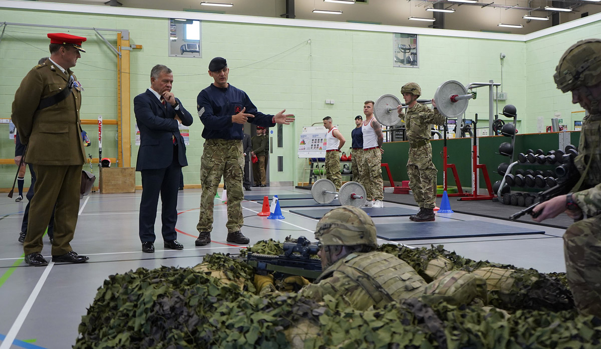 King attends military program at British battalion