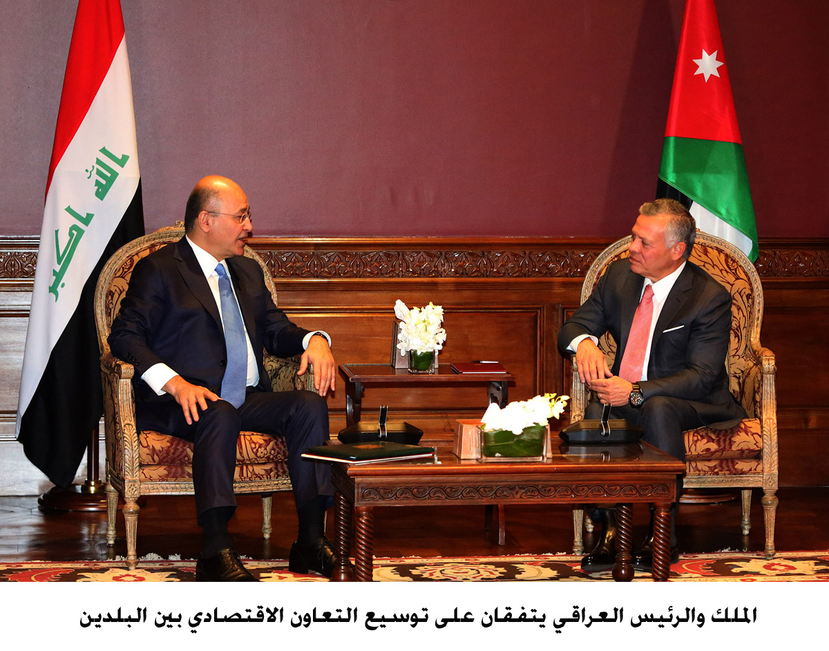 King, Iraqi president seek further economic cooperation