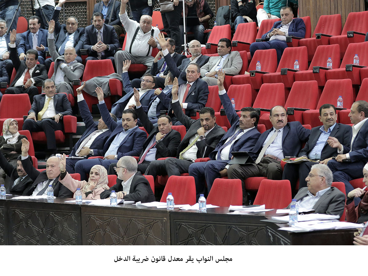 Lawmakers pass income tax draft law