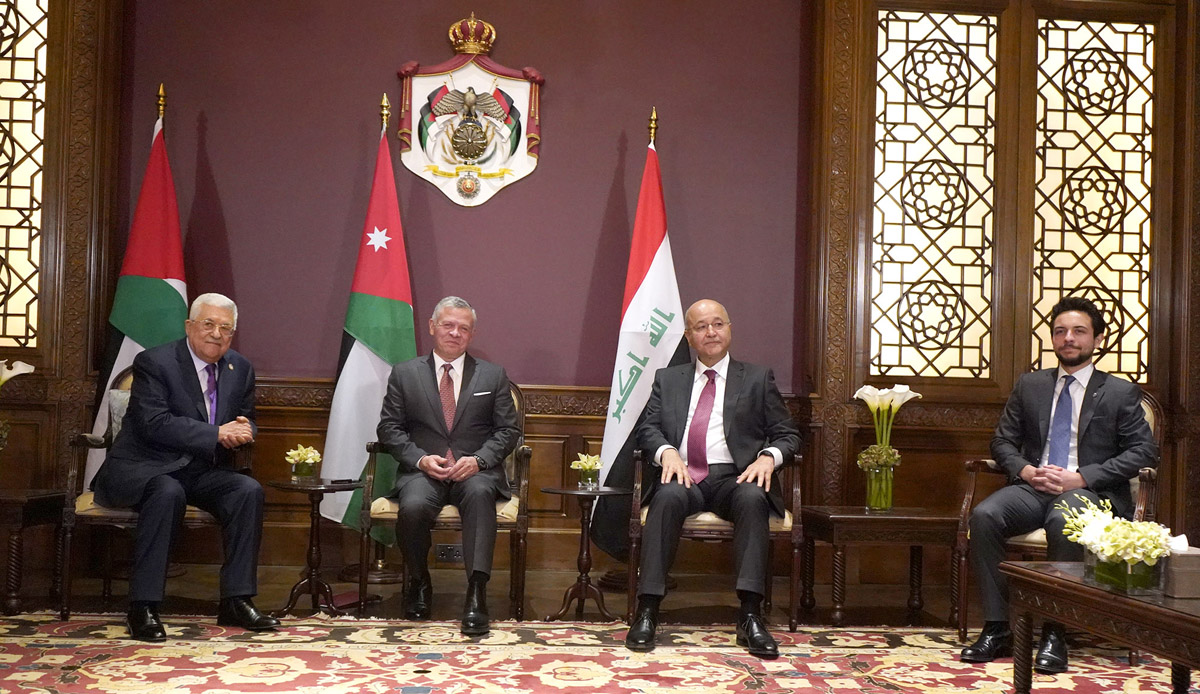 King holds trilateral meeting with Iraqi, Palestinian presidents