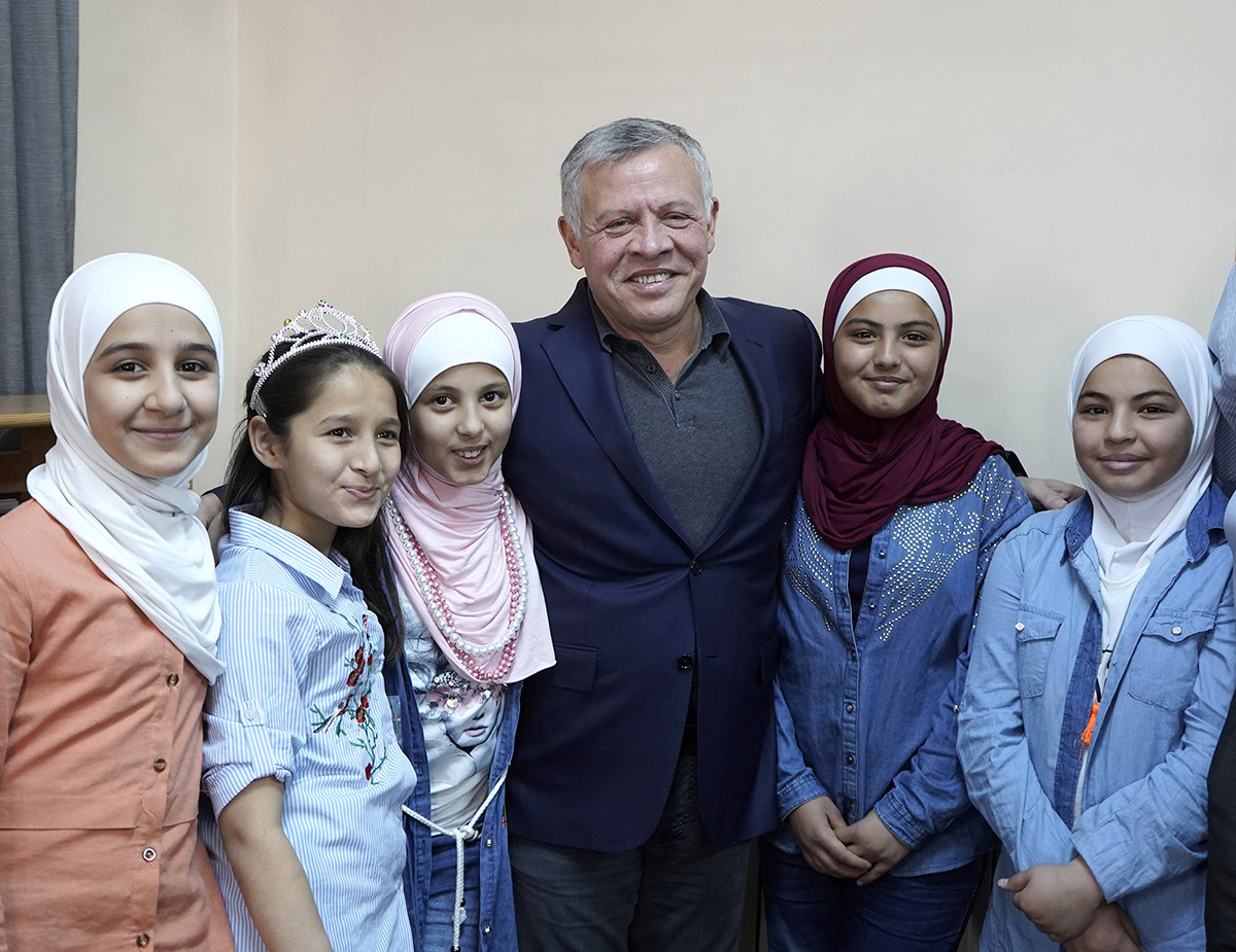 King checks on children at orphan care homes