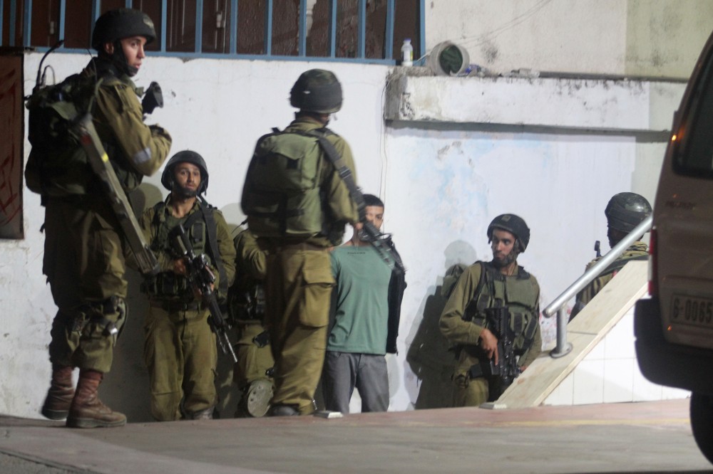Israeli forces arrest 23 Palestinians in West Bank