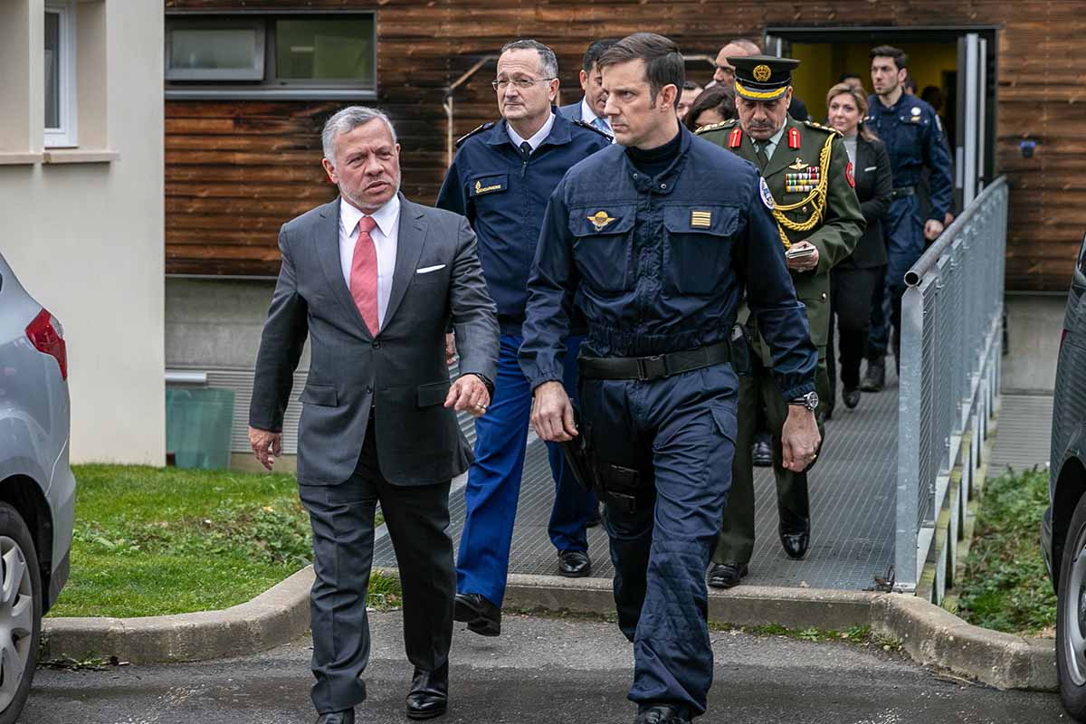 King visits French gendarmerie group, attends drill