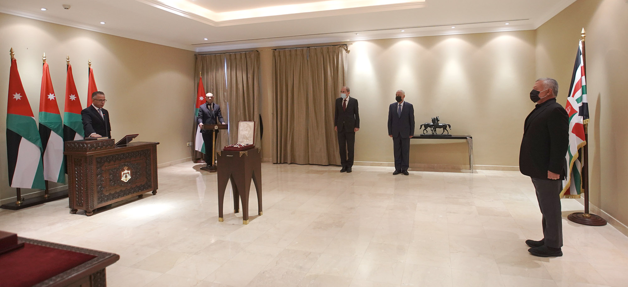 King swears in new ambassadors