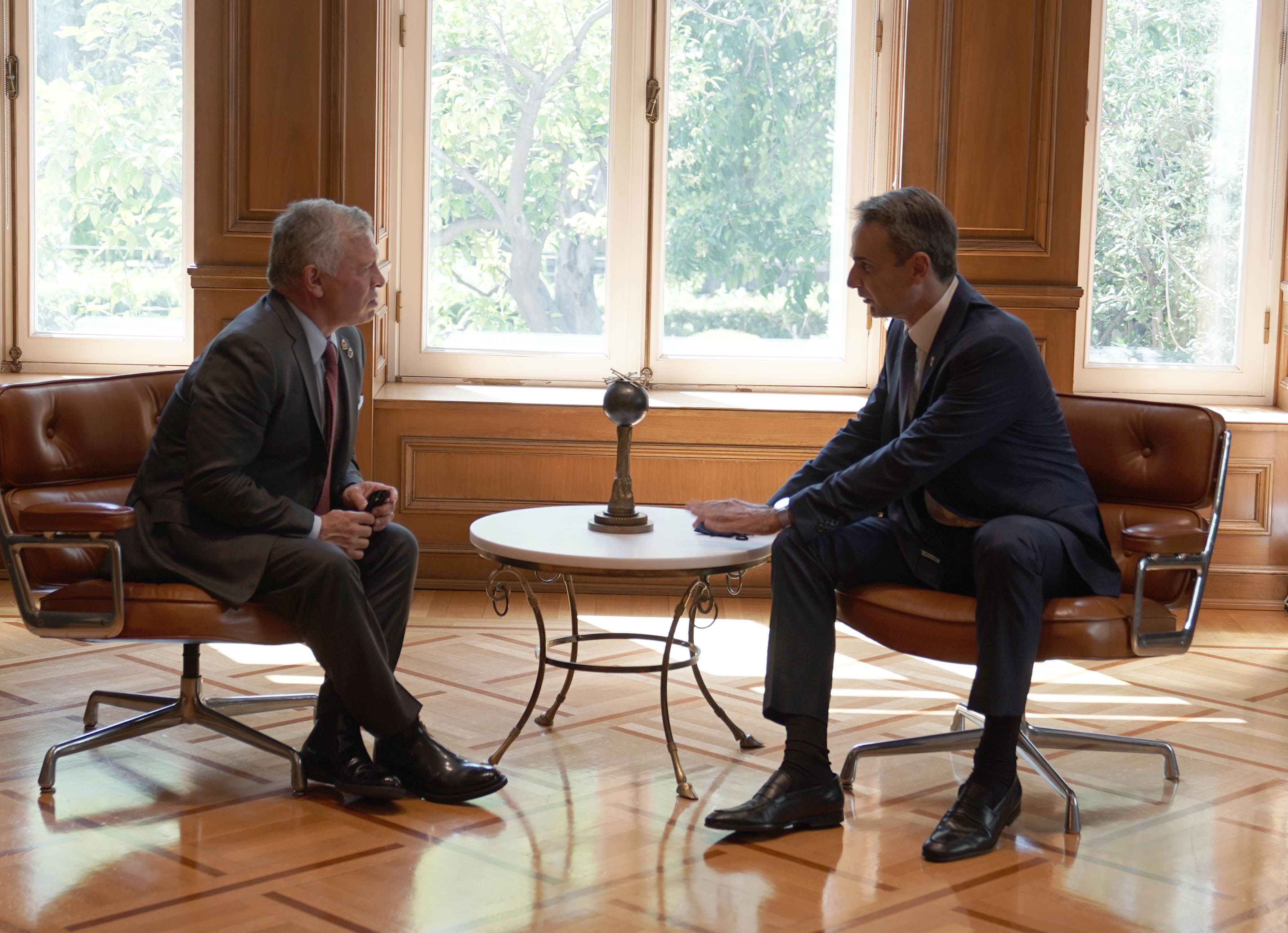 King meets with Greek PM