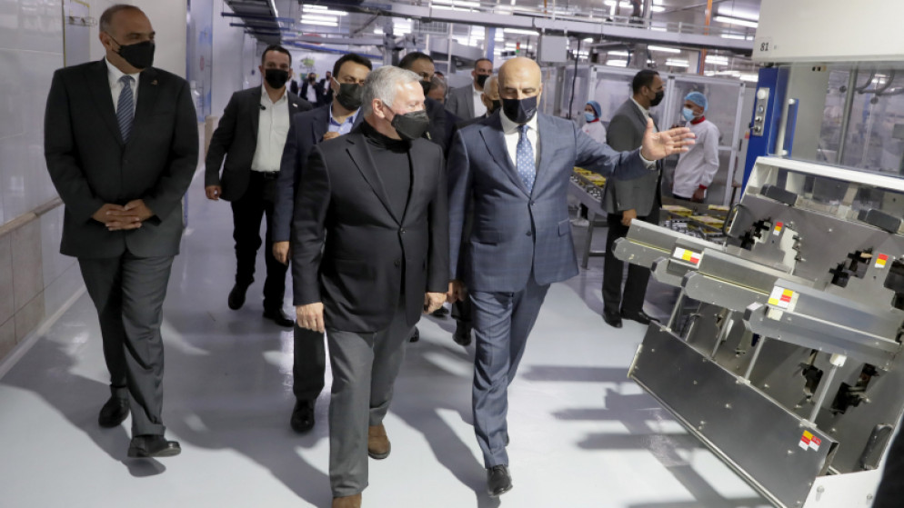 King visits factories in Al Qastal