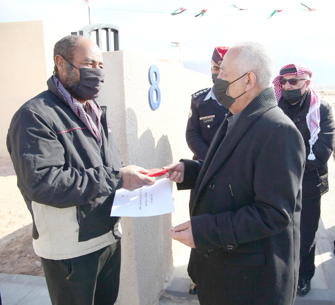 Royal Initiatives: 26 poor families receive new homes in Karak, Madaba