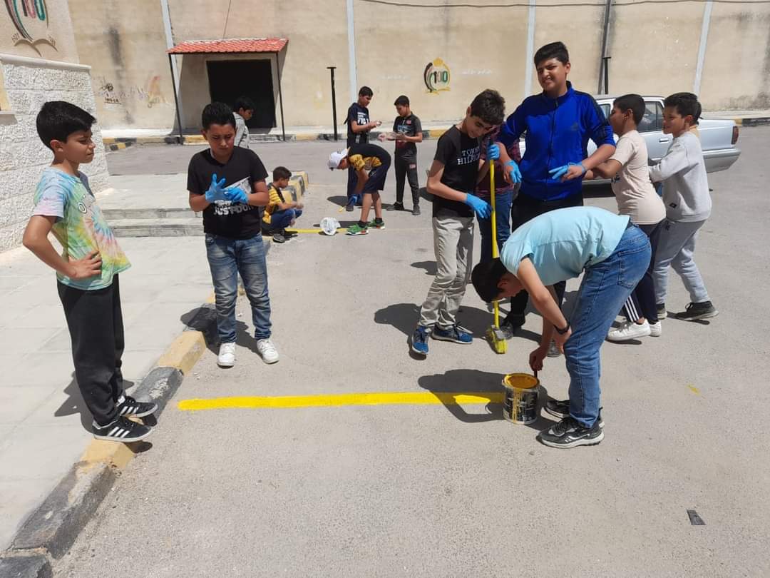 يوم عمل تطوعي بمركز شباب وشابات غرب إربد