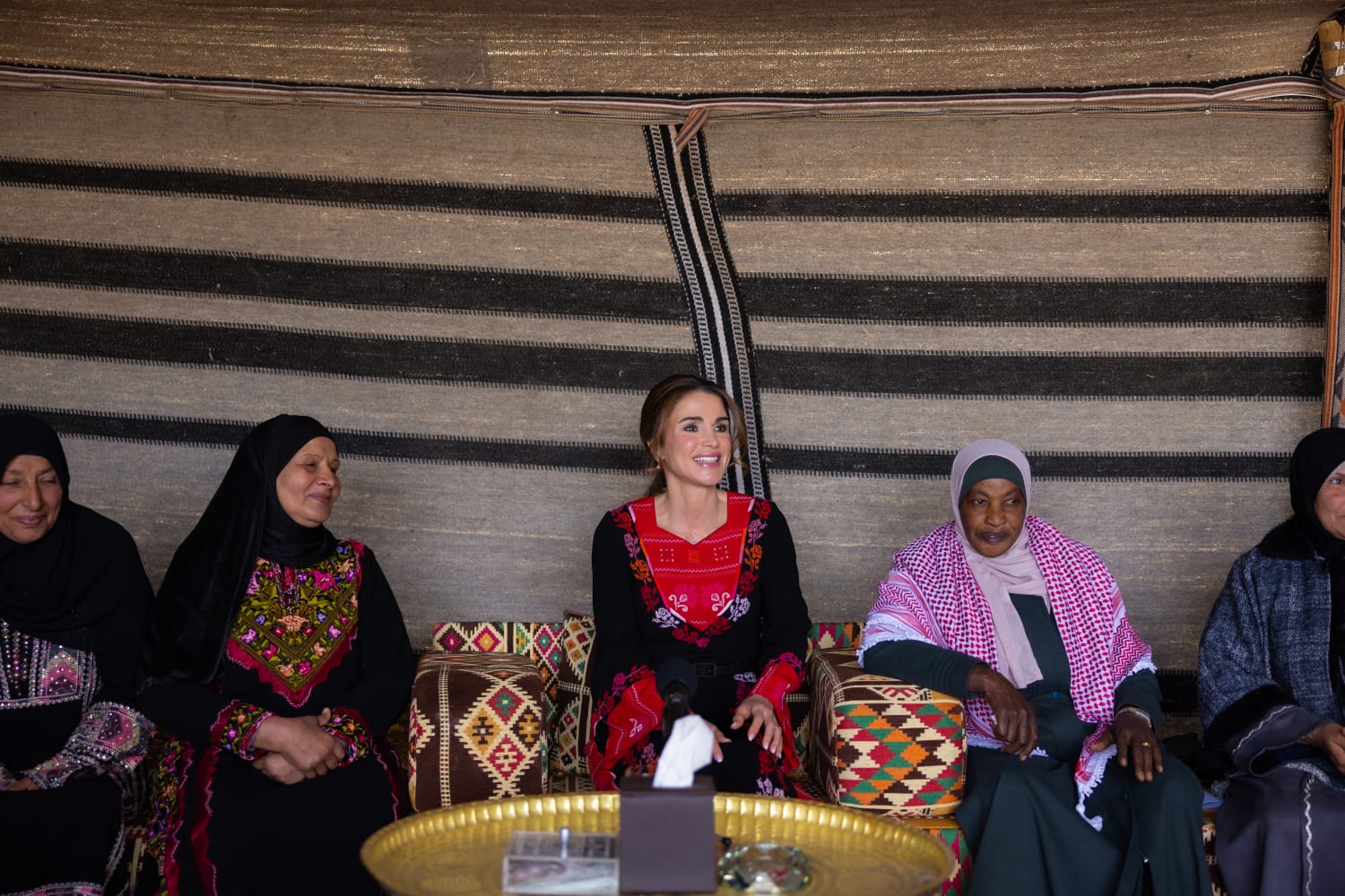 Queen meets women in Al Quwayrah; visits income-generating projects