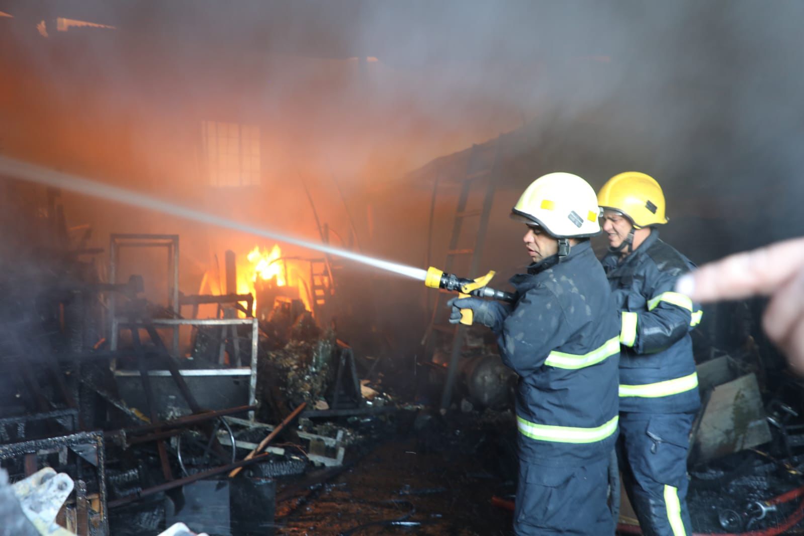 Firefighters extinguish fire in 3 warehouses of wedding supplies in Amman