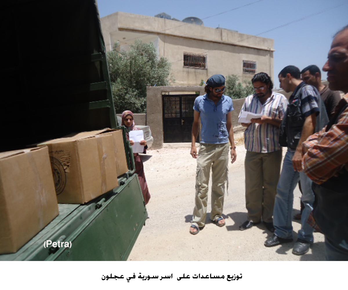 توزيع مساعدات على اسر سورية في عجلون