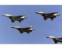 Israeli airstrikes kill 14 Palestinians, injure 49