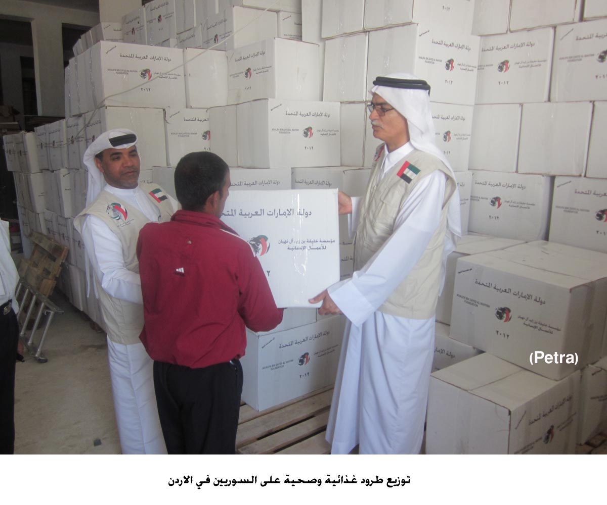 توزيع طرود غذائية وصحية على السوريين في الاردن