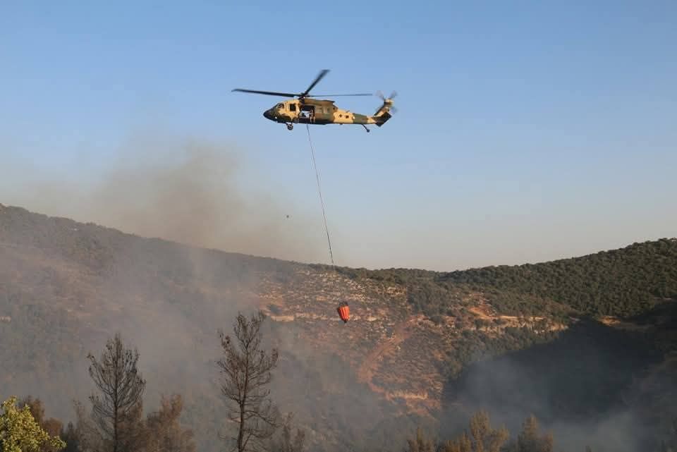 الدفاع المدني وسلاح الجو يخمدان الحريق في أحراش جرش