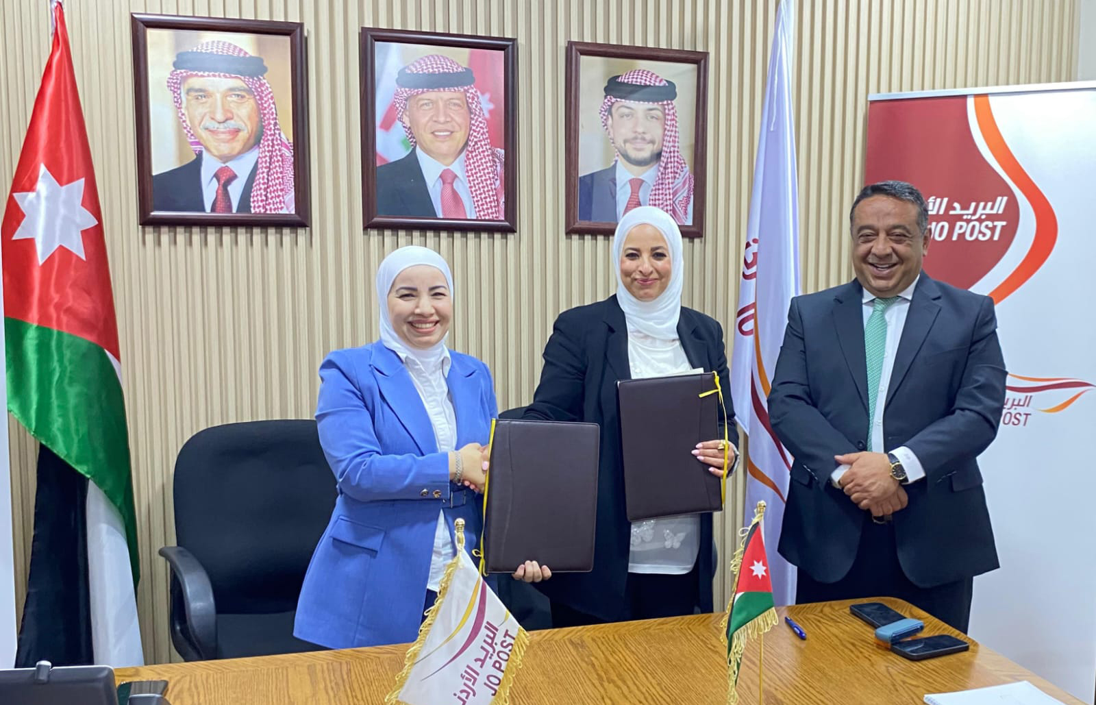 اتفاقية تعاون بين صندوق المعونة الوطنية وشركة البريد الأردني